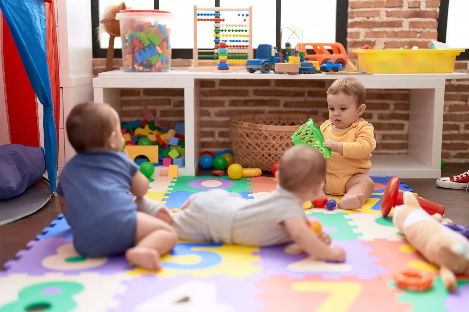 A safe and stimulating nursery room for infants at Artec Academy Miami Infant classroom and nurturing environment at Artec Academy daycare in Miami