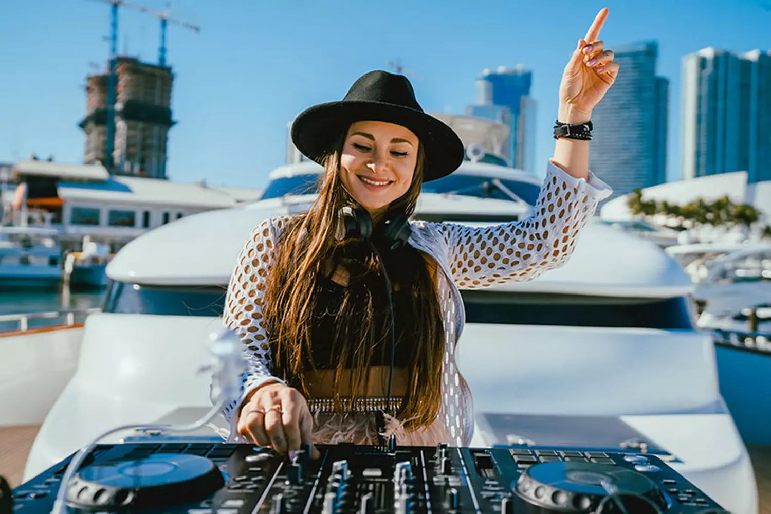 DJ Set on a Miami Yacht Party | Sunshine, Beats & Ocean Vibes DJ playing music at a luxury yacht party in Miami with ocean views and a lively crowd under the sun