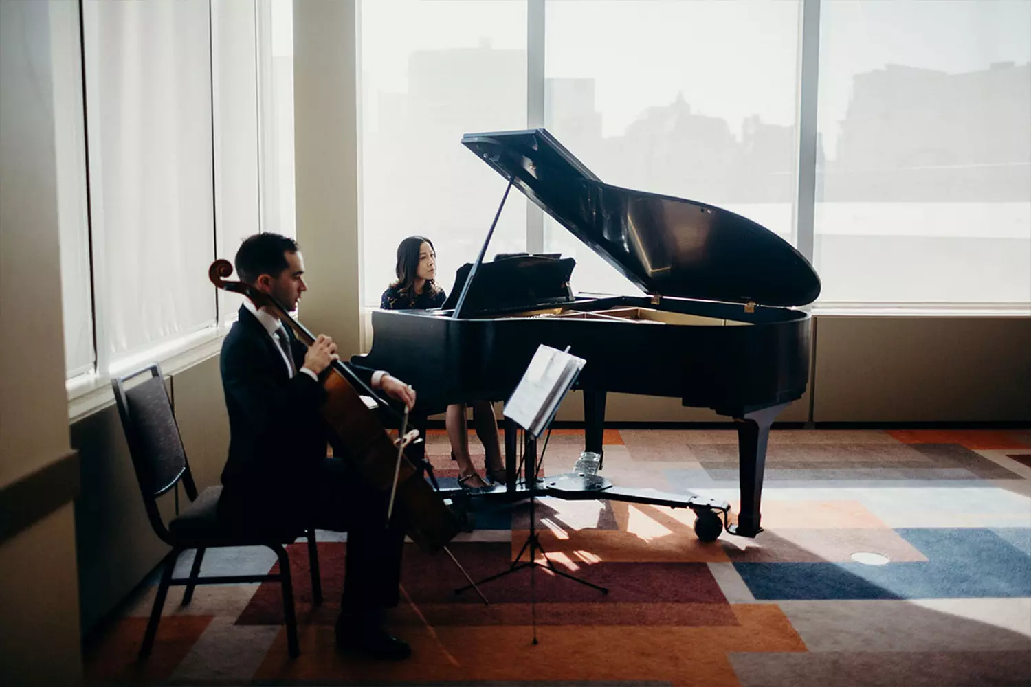 Premium Live Music Performances in Miami | Elevate Your Event with Professional Musicians Live band performing at a luxury Miami event with palm trees, sunset, and guests enjoying vibrant music by the ocean