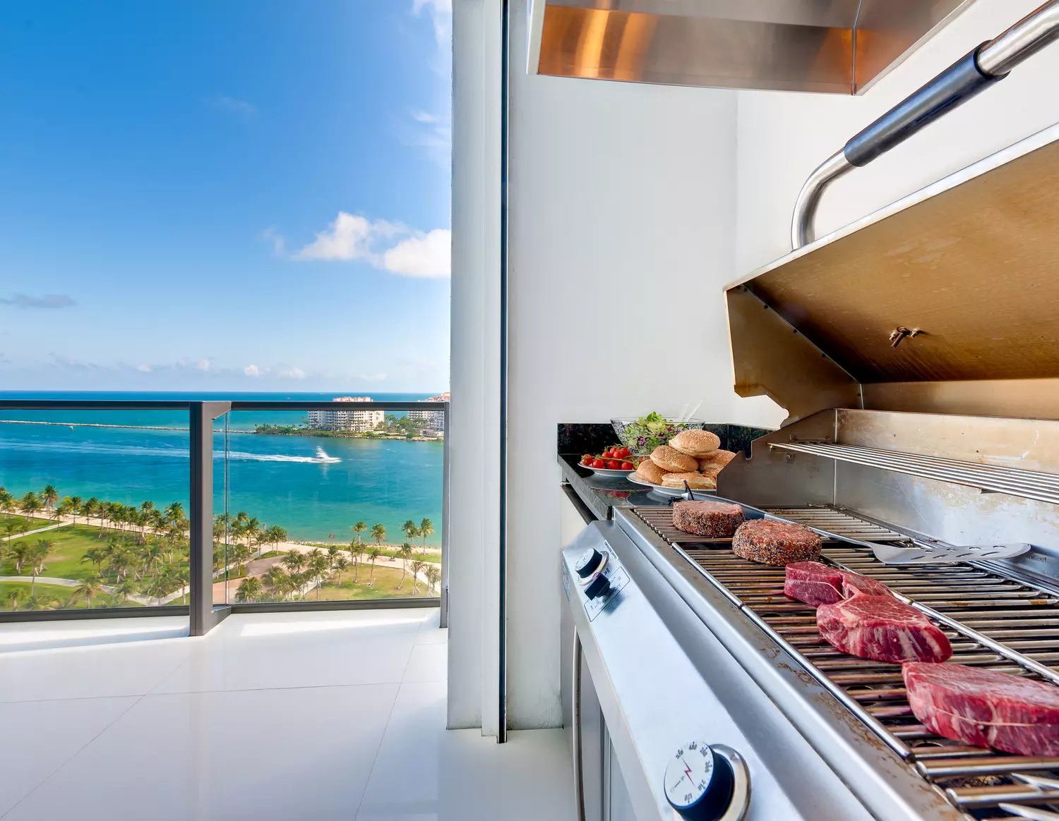 Miami Condominiums: Ocean View and Barbecue from Balcony — American Butler