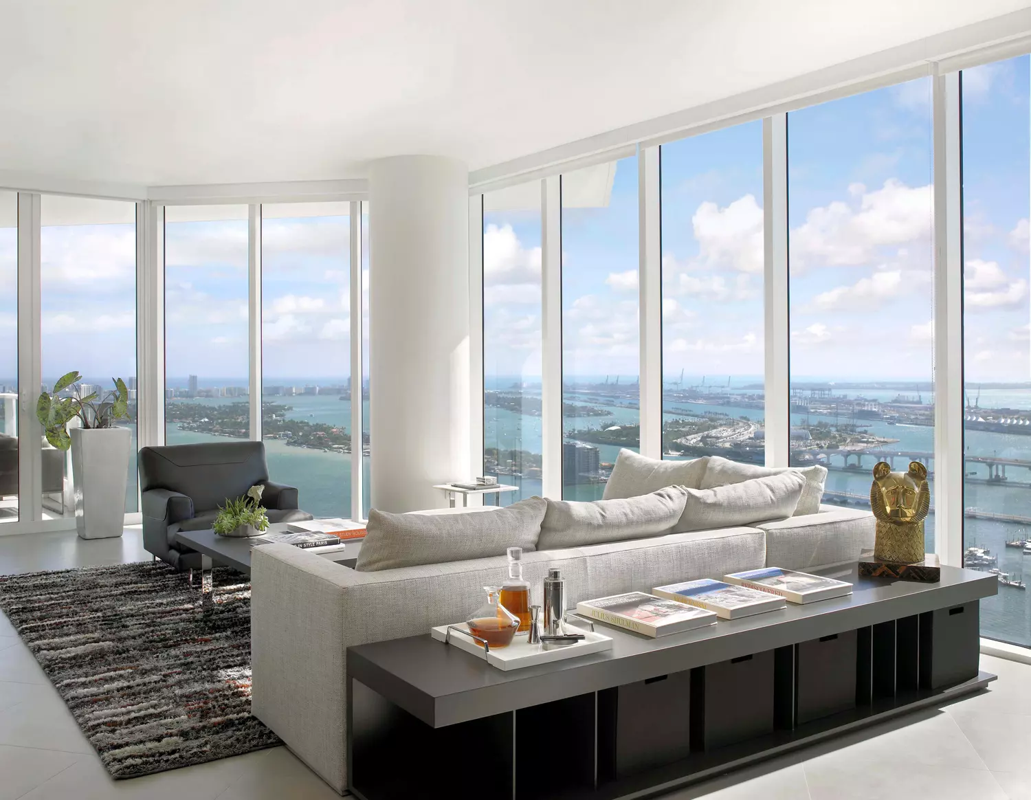 Buying an apartment in Miami — a young couple is happy with the purchase in their apartment