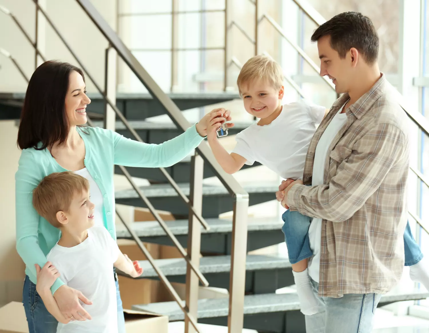 Photo of a happy family in the living room of a rented house in Miami — American Butler