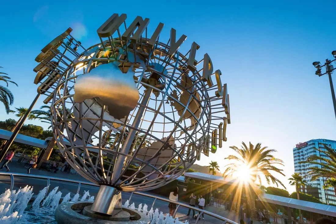 Photo of a globe with the Universal Studios Hollywood logo