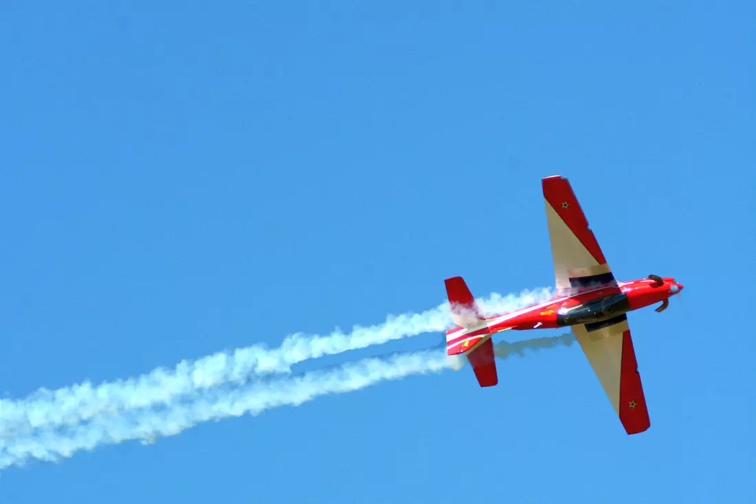 A plane does a trick on a tour from American Butler