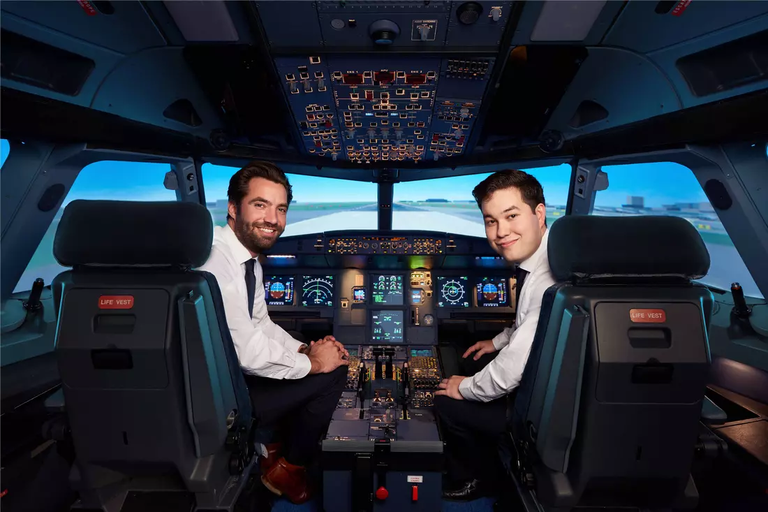 Professional flight instructor in the cockpit — simulator training experience with American Butler Instructor in a commercial aircraft simulator cockpit in the USA