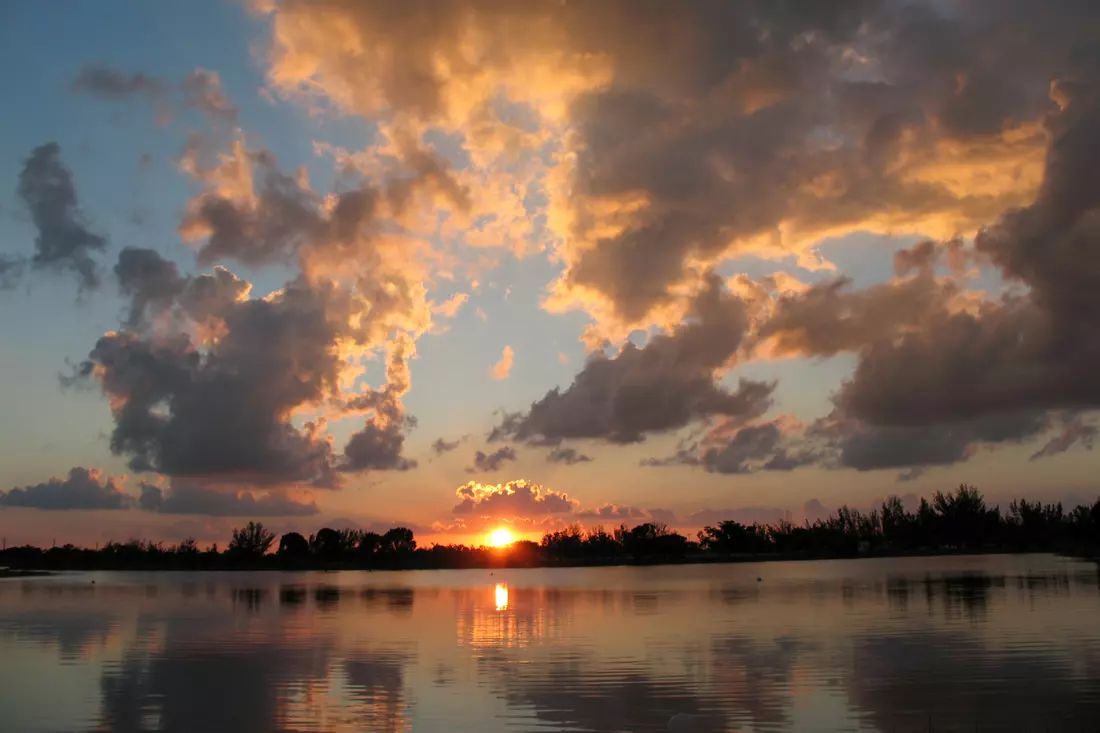 Amelia Earhart Park — sunset photo over the lake — American Butler