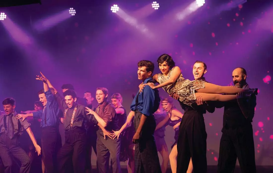 Photo of actors on stage of the Naples Players Theater Company at the Sugden Theater