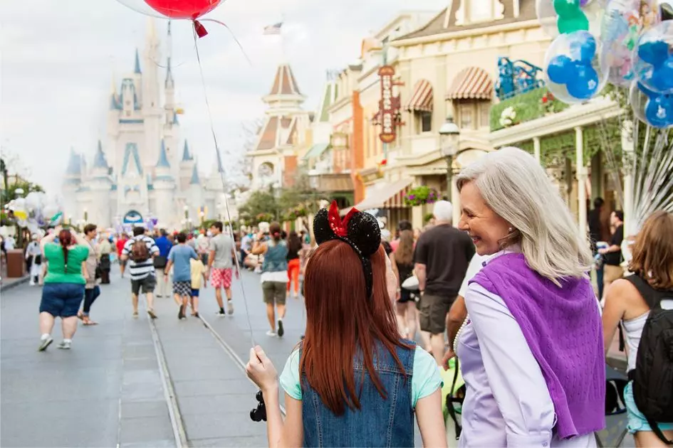 Disney World in Orlando — photo of people walking in the park Disney World in Orlando — photo of people walking in the park