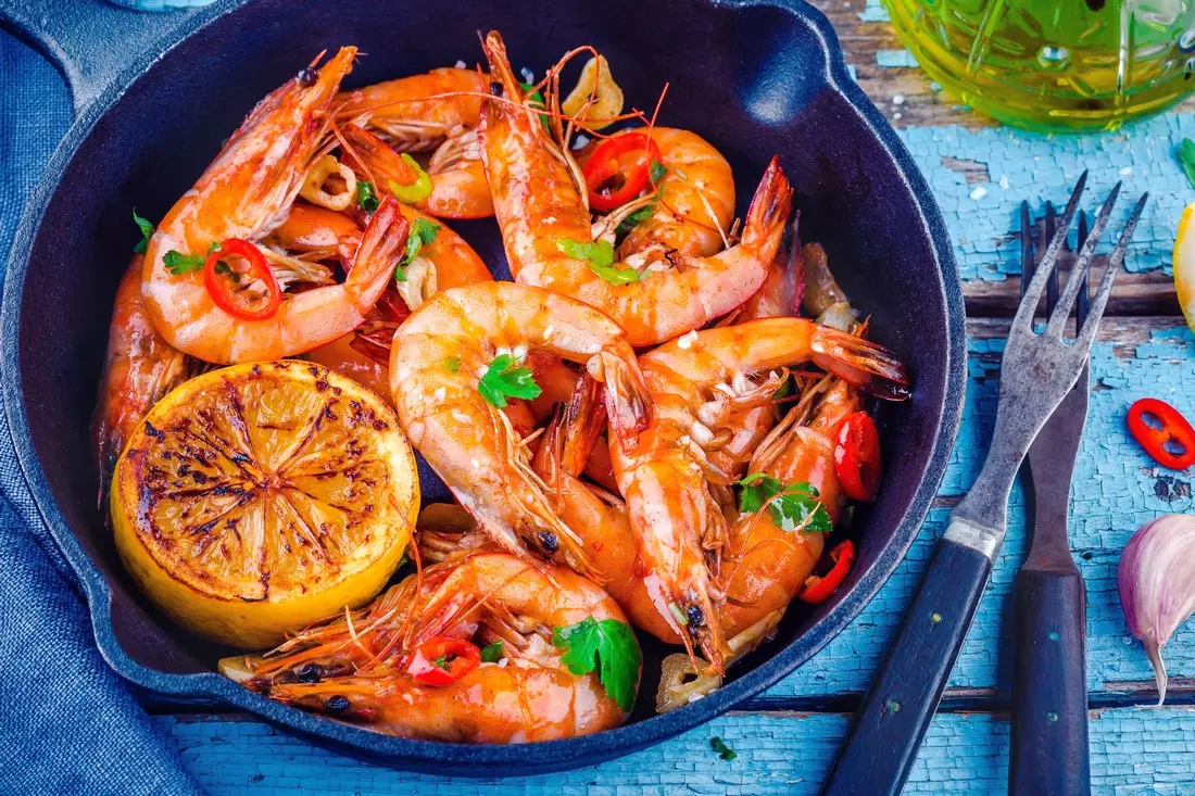 Culinary delights of Louisiana: photos of boiled shrimp in a pot