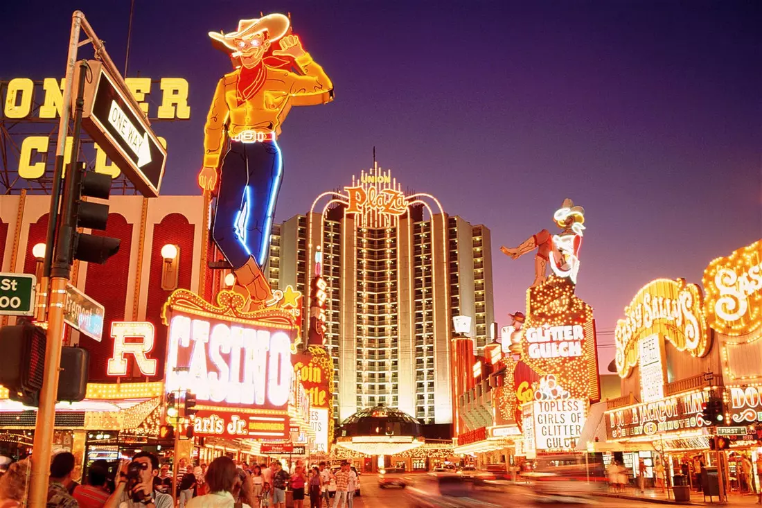 Neon lights and casino signs in Las Vegas on Fremont Street at night