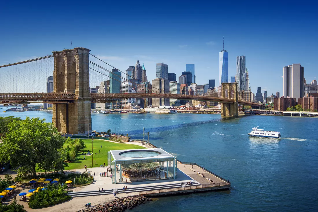 Aerial view of the Brooklyn Bridge over the East River with Manhattan skyscrapers