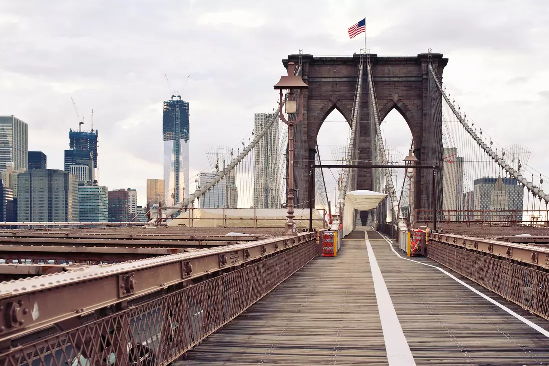 Brooklyn Bridge with renovation works and New York City skyline