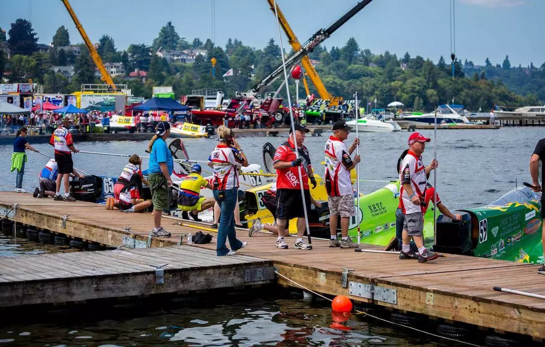 People at the pier at the Seafair Festival in Seattle — American Butler