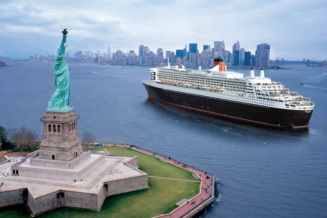 Photo of a cruise ship near the Statue of Liberty in New York — US East Coast Cruises — American Butler