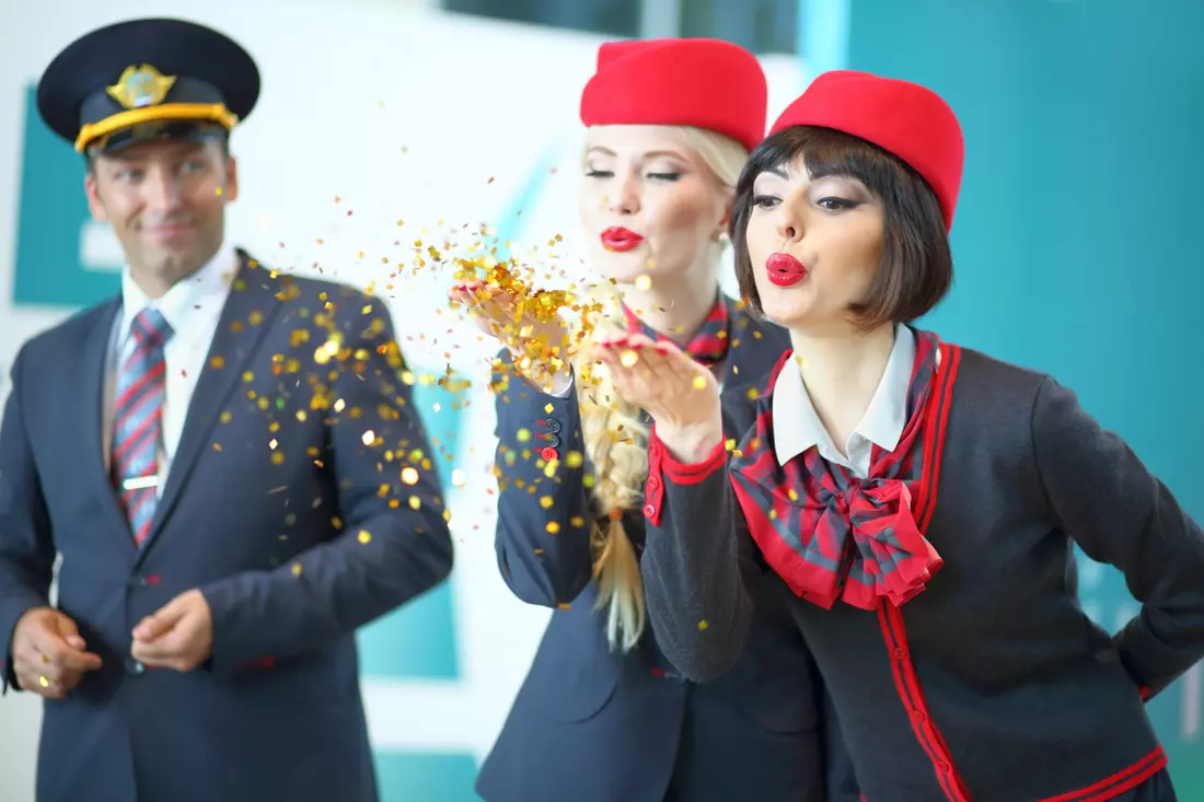 Buy air tickets — photo of a girl at the airport — American Butler