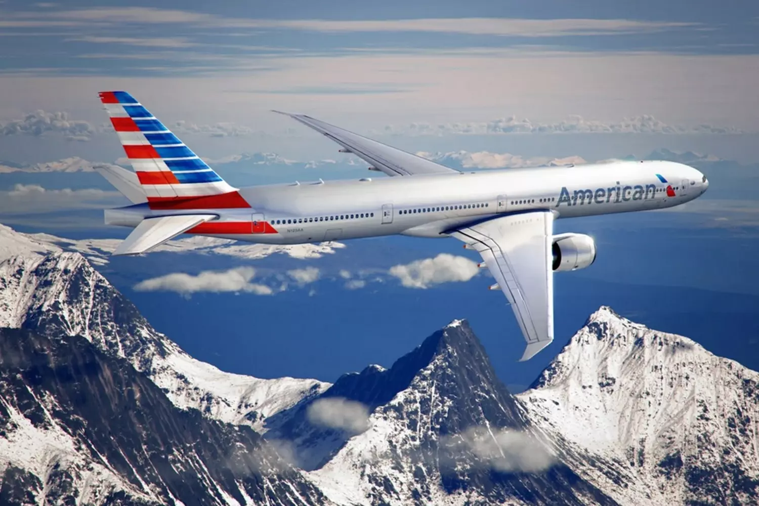 American Airlines flight soaring over majestic snow-capped mountains A powerful image of an American Airlines passenger jet flying over a stunning range of snow-covered mountain peaks under a clear blue sky