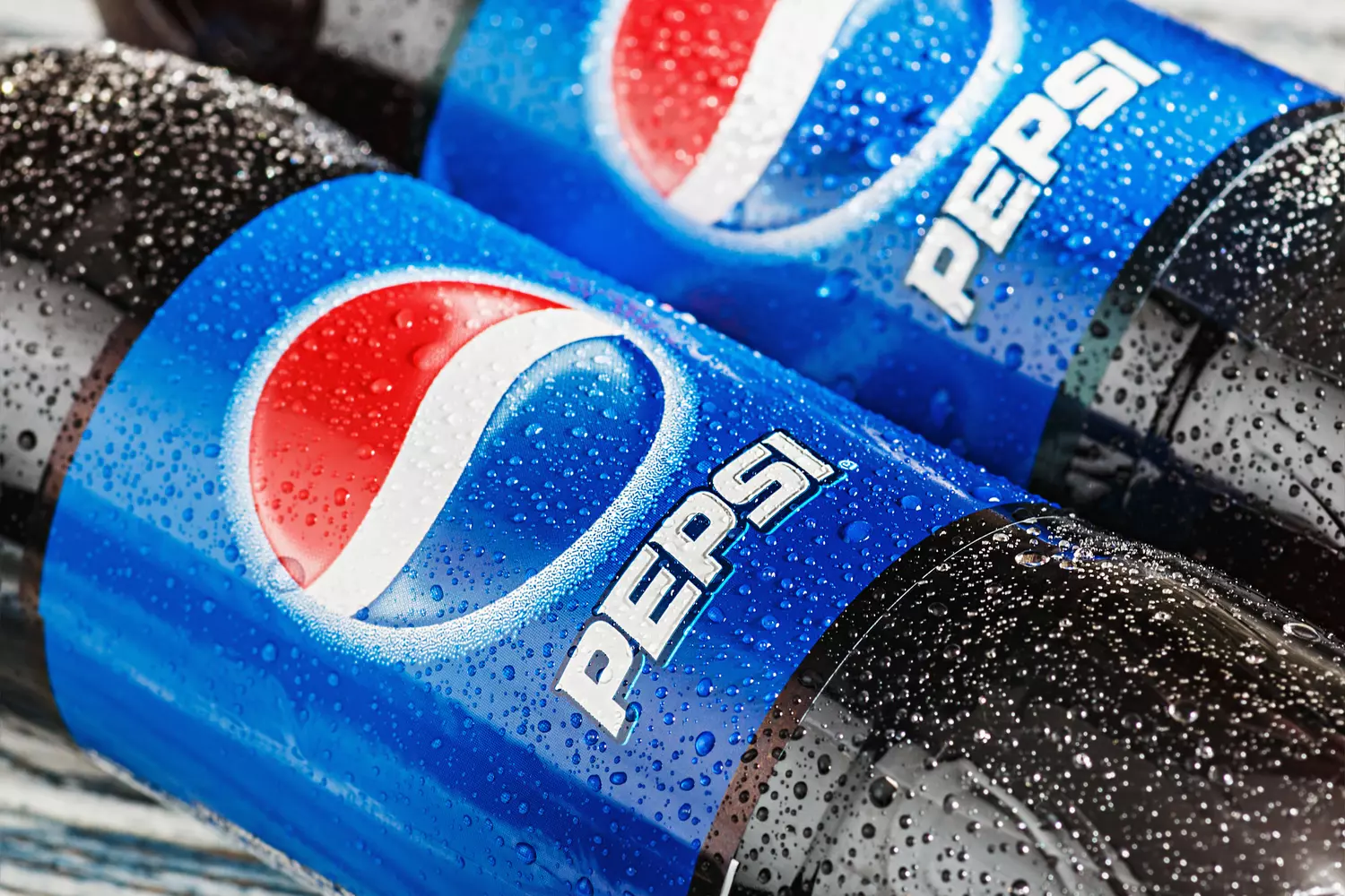 How Cola differs from Pepsi — photo of Pepsi drink bottles — American Butler