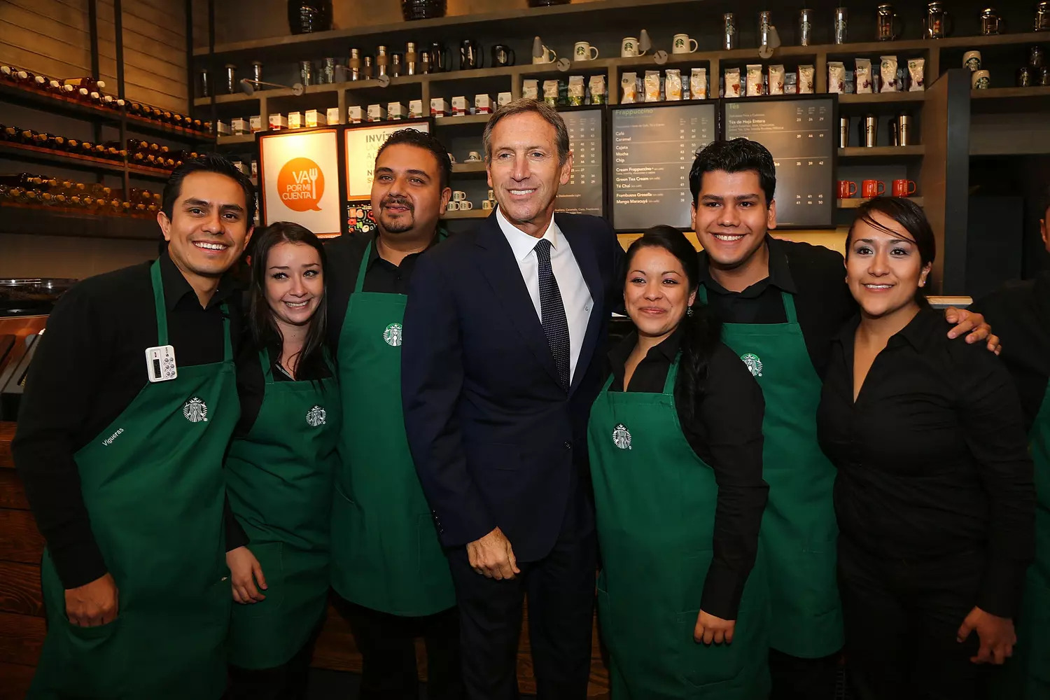 Starbucks Empire President Howard Schulz with the staff of one of the coffee houses — American Butler