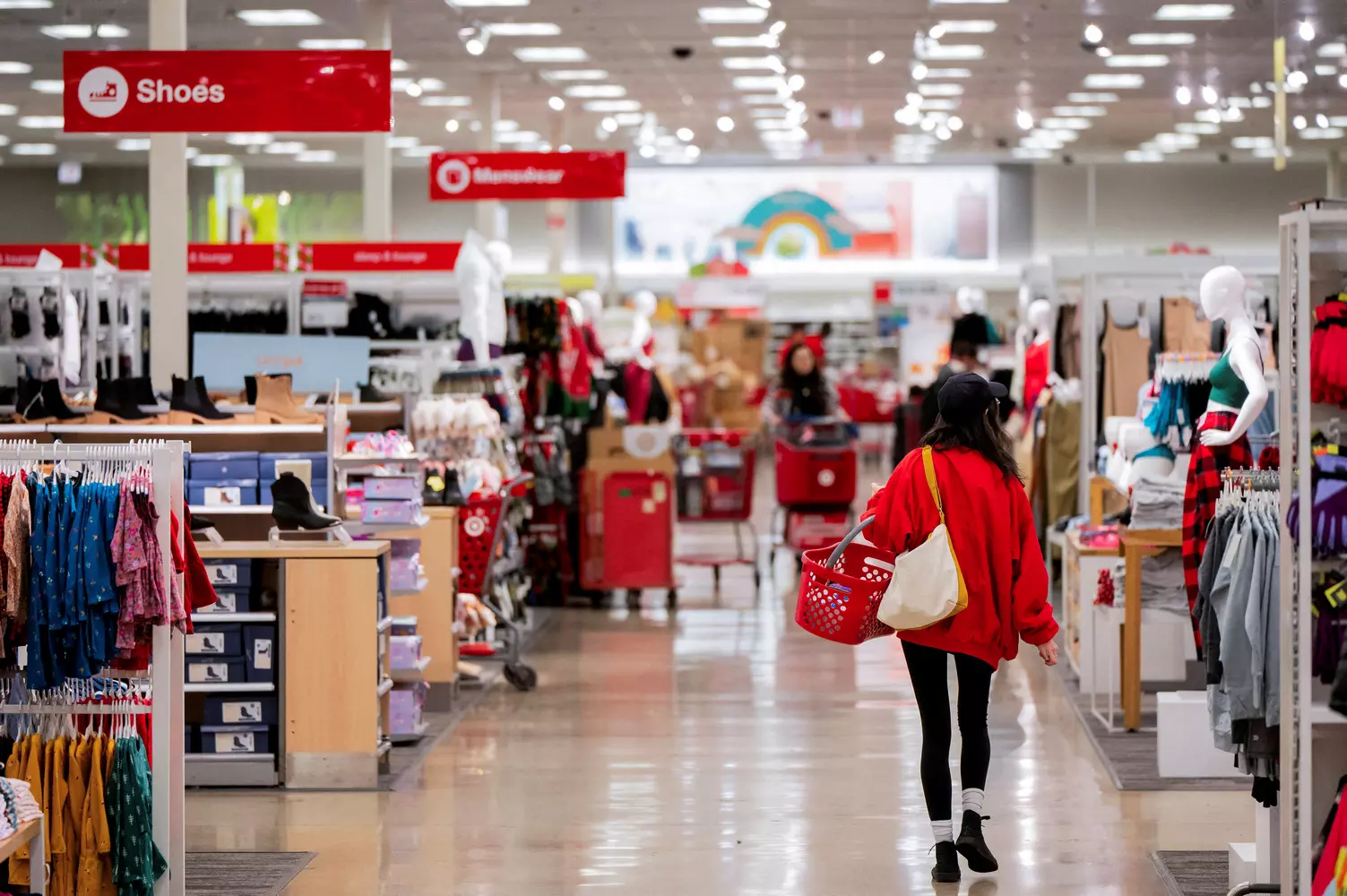 Inside Target USA: Exploring America's Favorite Upscale Discount Store Bright and spacious interior of a Target store in the USA, featuring wide aisles with stylish home goods, clothing displays, and the iconic red Target branding throughout the clean, organized space