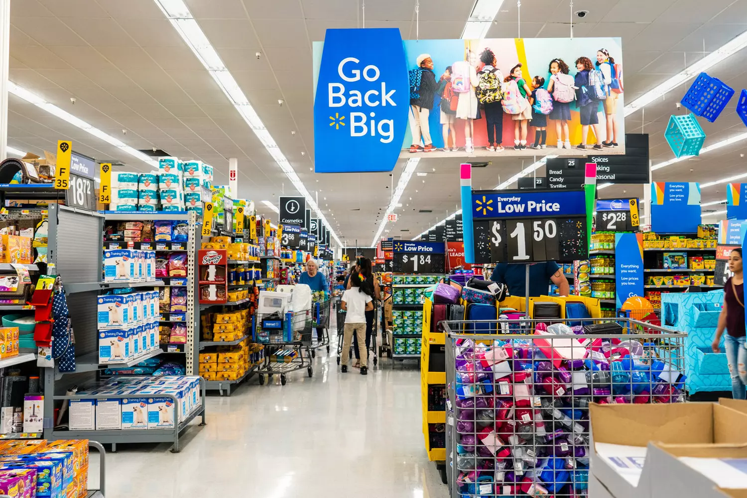 Inside Sam's Club USA: A Look at the Members-Only Warehouse Experience Spacious interior of a Sam's Club warehouse store showing tall shelves stocked with bulk products, shoppers with oversized carts, and the signature yellow price tags under bright warehouse lighting