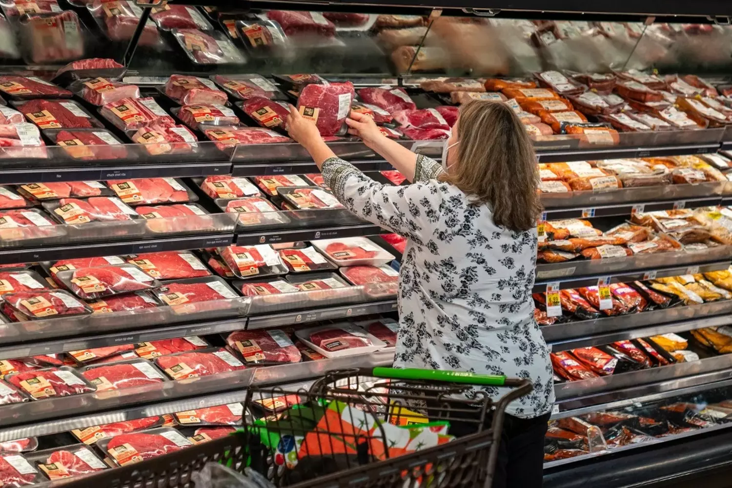 Endless Aisles: Inside the Product Paradise of American Supermarkets Long perspective of American supermarket shelves stocked with colorful packaged goods, featuring neatly organized rows of cereals, snacks, and beverages under bright store lighting