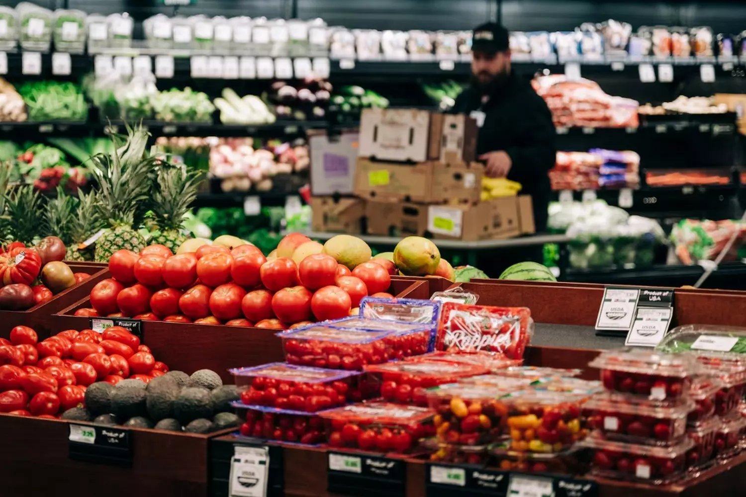 Endless Aisles: Inside the Product Paradise of American Supermarkets Long perspective of American supermarket shelves stocked with colorful packaged goods, featuring neatly organized rows of cereals, snacks, and beverages under bright store lighting