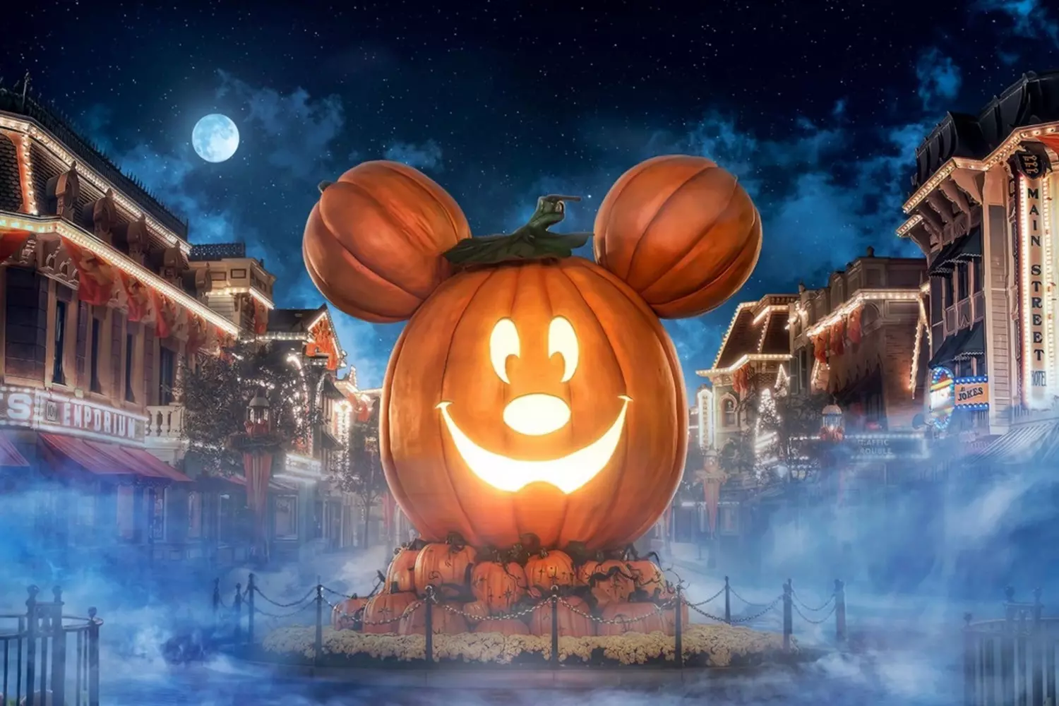 Mickey-O'-Lantern Magic: Disney's Spooktacular Halloween Pumpkin Giant Mickey Mouse-shaped jack-o'-lantern at Disneyland, glowing with orange lights, surrounded by fall decorations and happy visitors taking photos with the iconic Halloween display