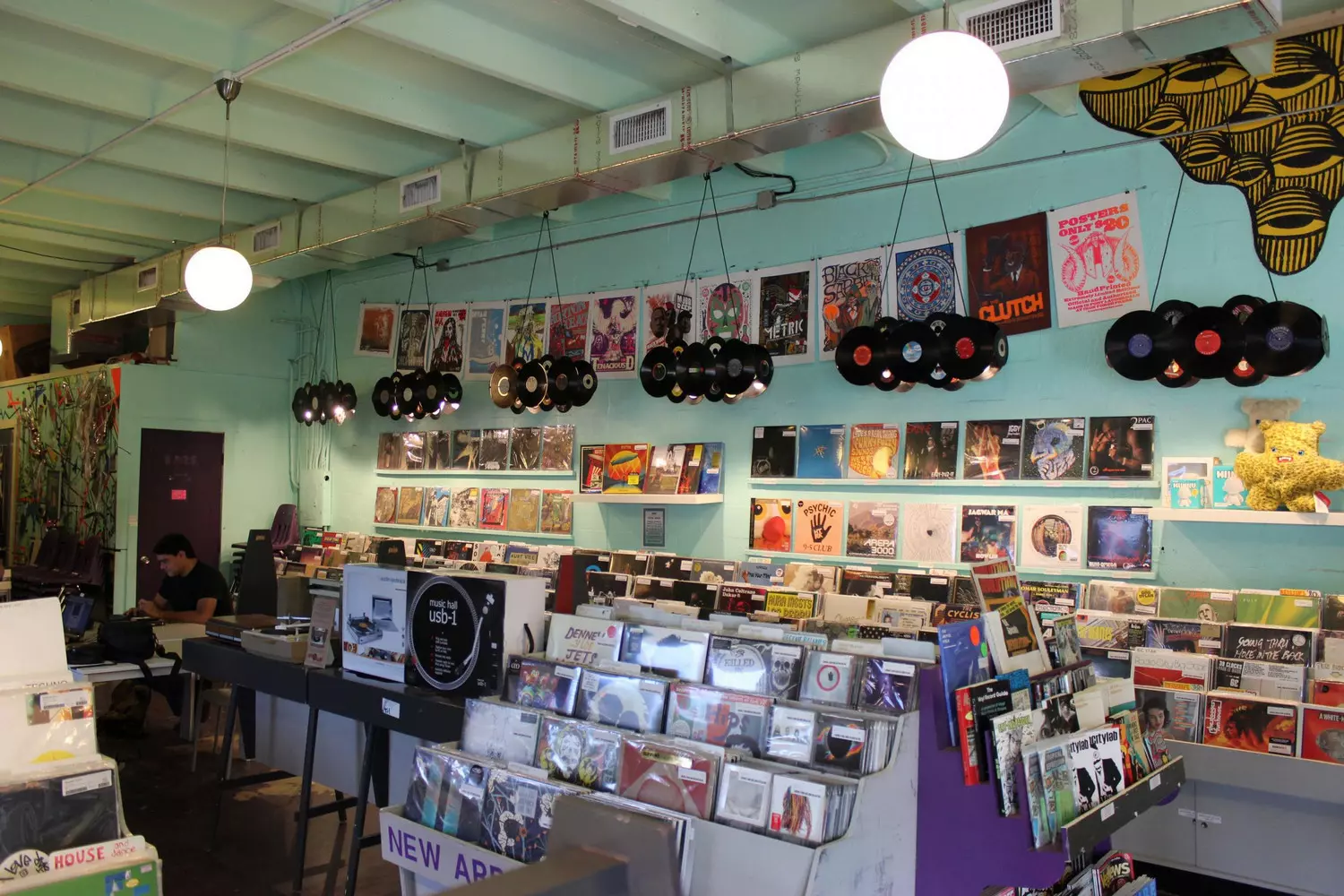 Music Store — Photo Shelves with Vinyl Records — American Butler