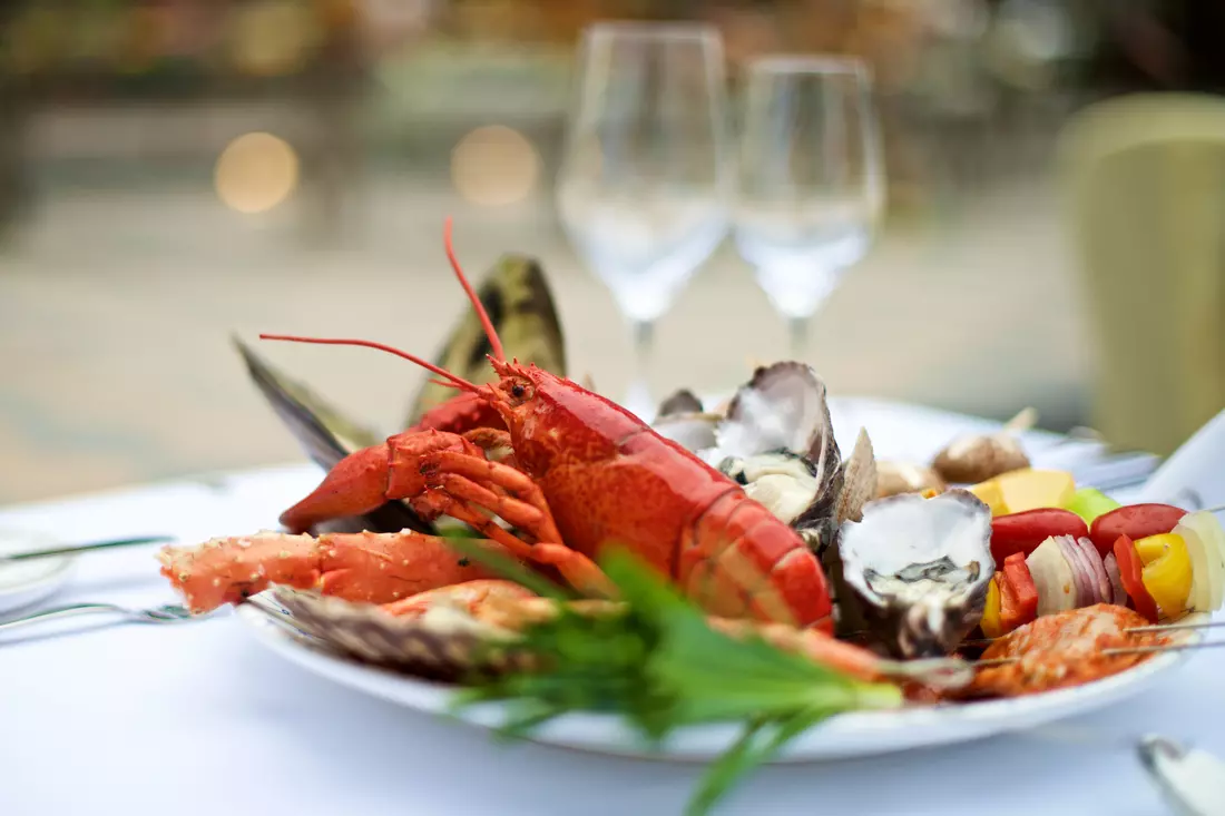 Photo of a boiled lobster dish at Burger & Lobster in New York City