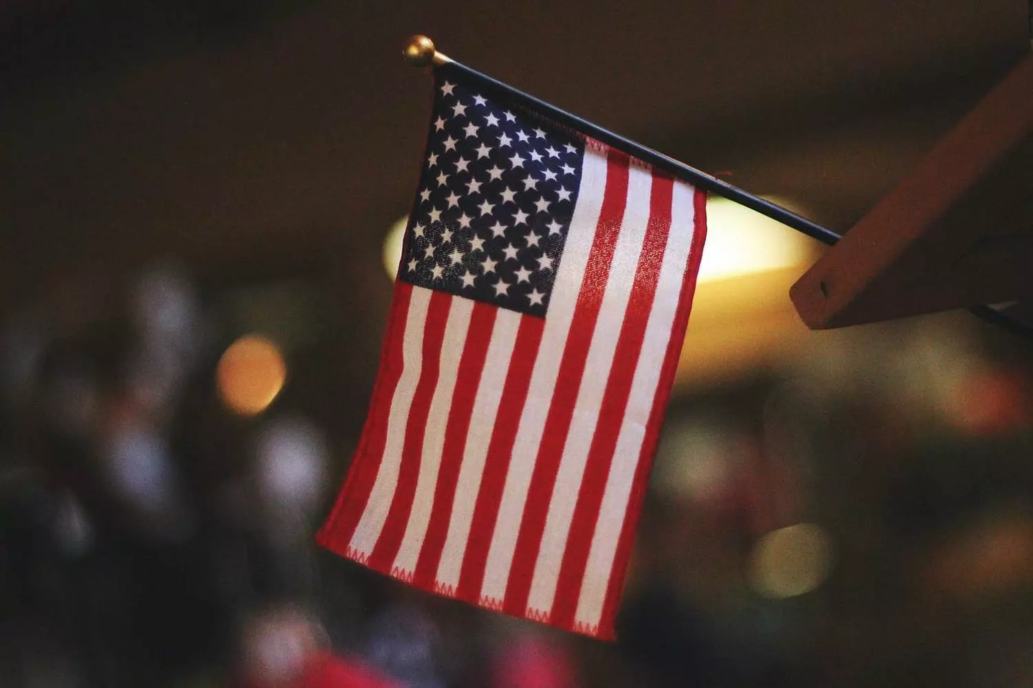 American Flag — the national symbol of the United States High-resolution image of the American flag, showcasing the fabric texture and details of the stars and stripes