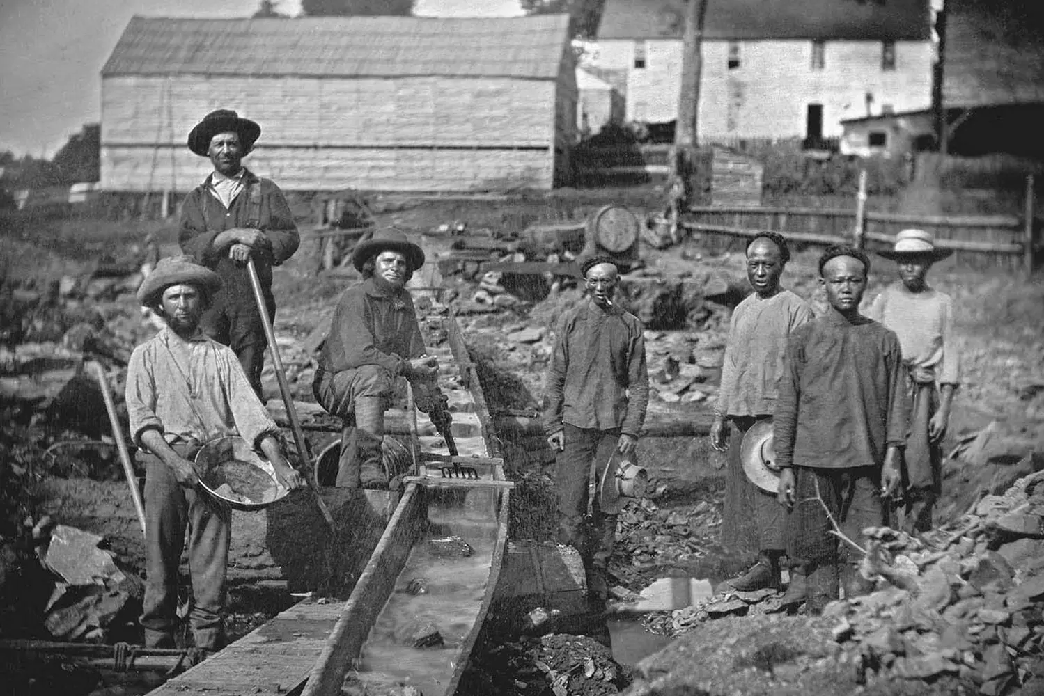 Gold Rush: The Prospectors Who Changed History Vintage photo of gold prospectors during the Gold Rush: men panning for gold in the river, dressed in worn-out clothes, surrounded by wild nature and simple tools