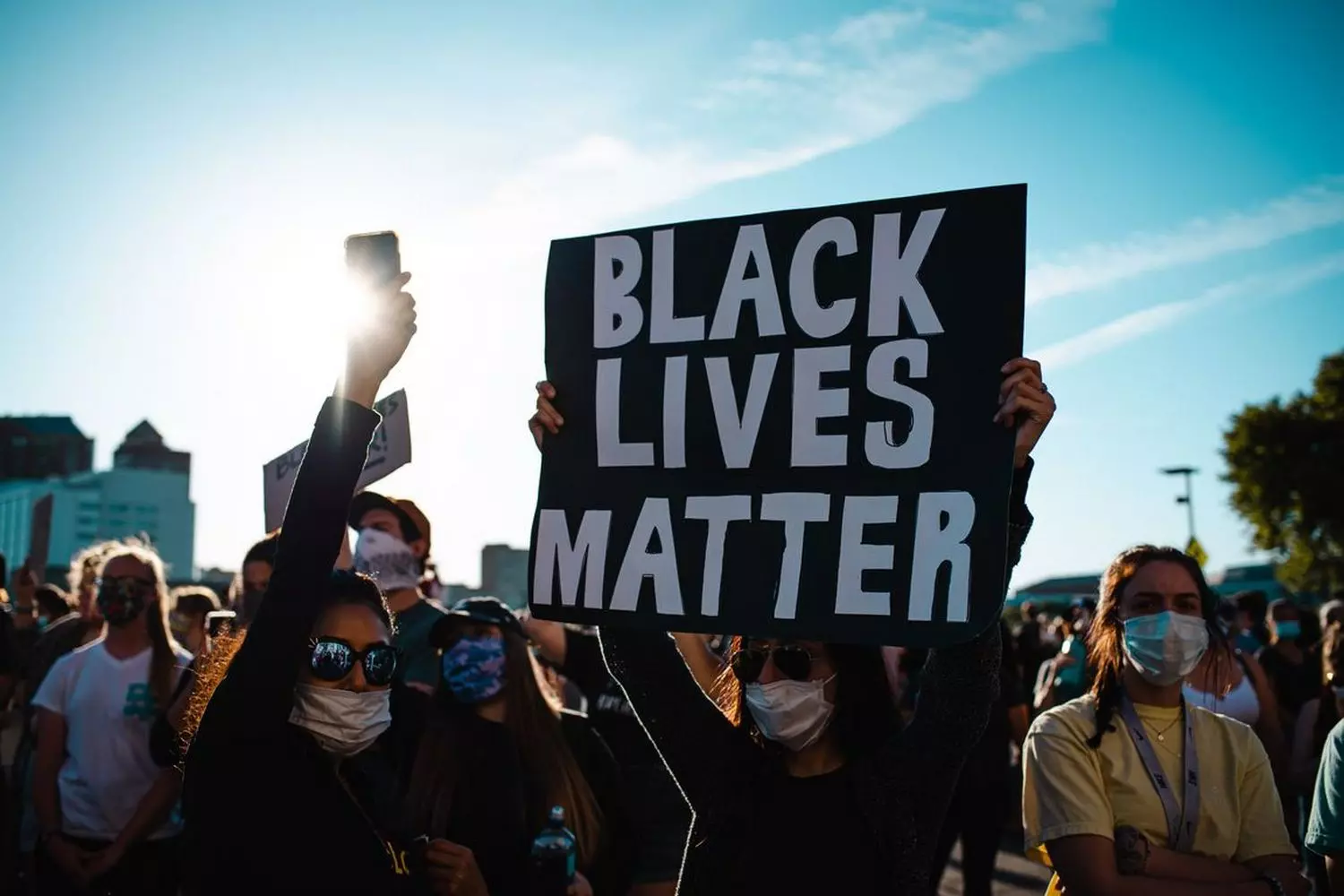 Black Lives Matter march — a protest against racial injustice Numerous participants in the protest holding BLM signs during a peaceful march for racial equality and police reform
