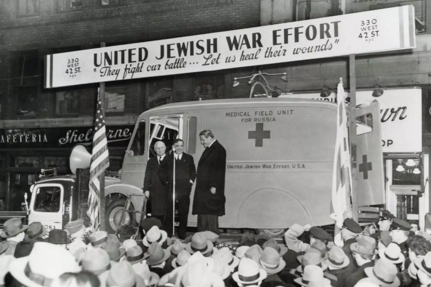 America Cares: 1940s Fundraising for Holocaust Survivors Post-war American citizens donating money at a street fundraiser table marked "Aid for Nazi Victims"