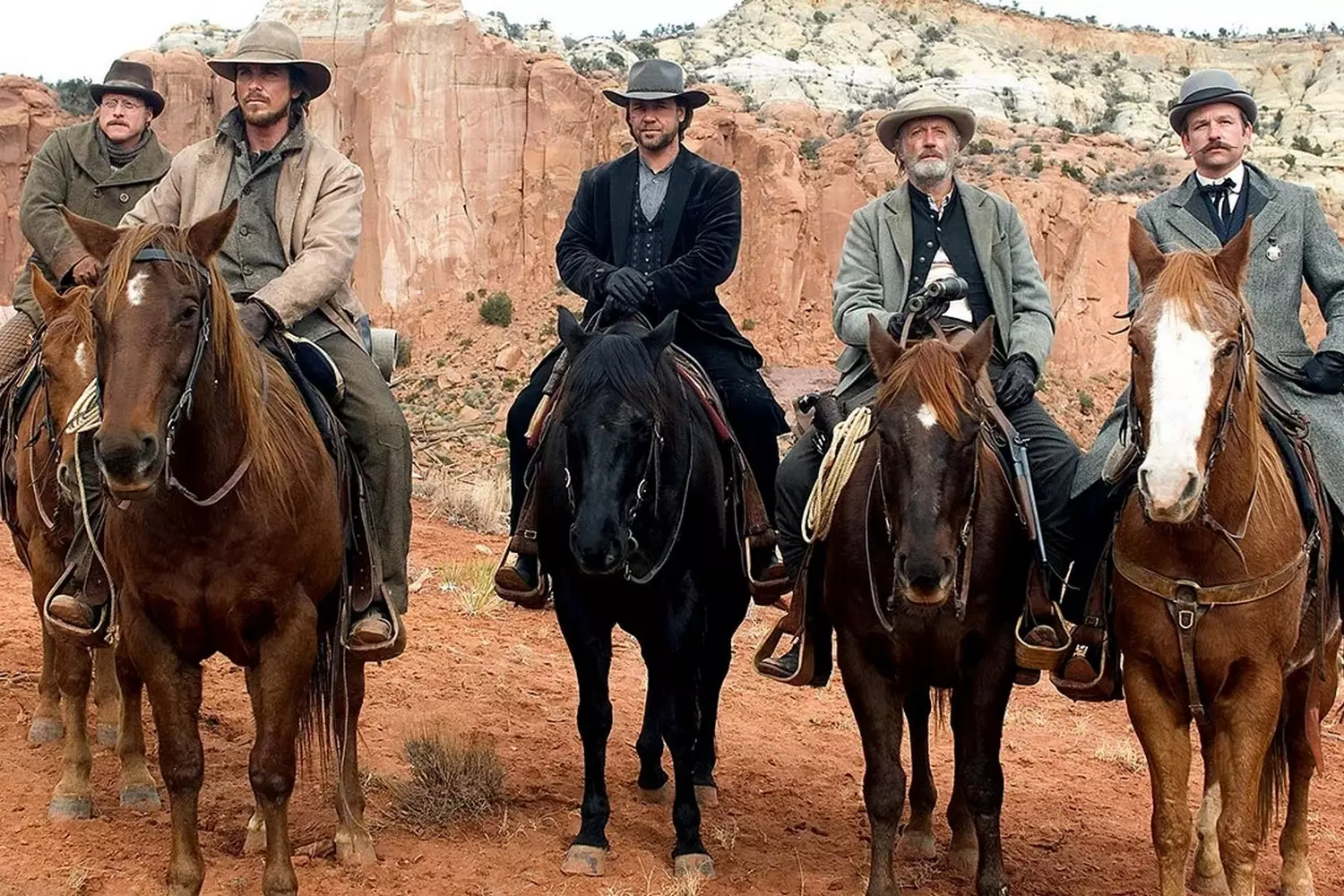 Classic Western Movie Chase Scene: Cowboys and Sheriffs on Horseback A thrilling action shot from a Western film