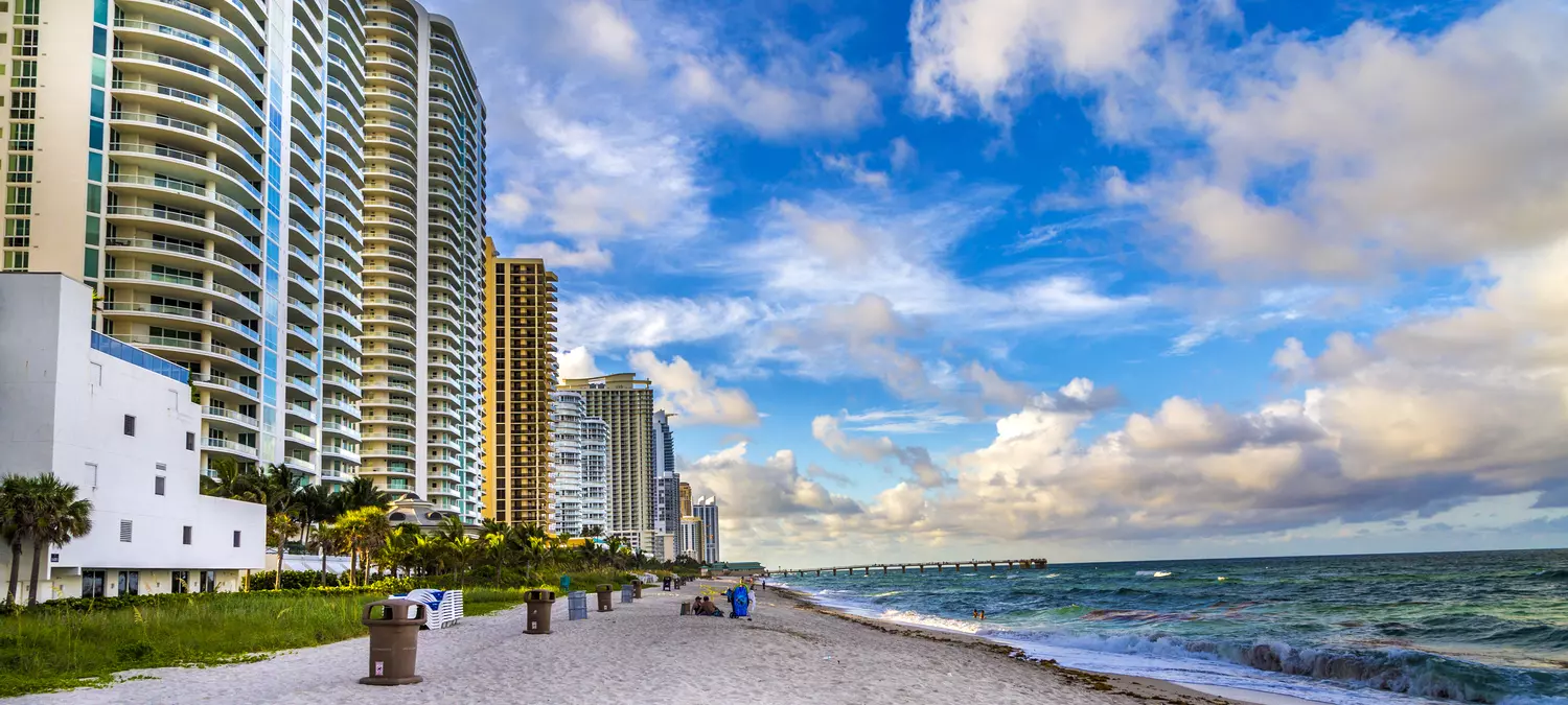 Advantages and disadvantages of buying a property in Miami — photos of residential buildings on Sunny Isles Beach — American Butler