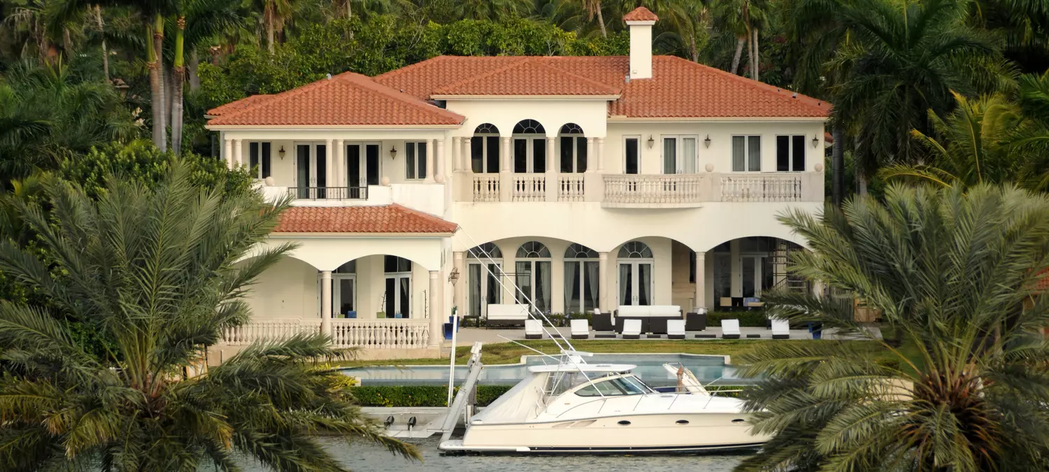 Miami home buying on a canal — South Florida canal villa photos — American Butler