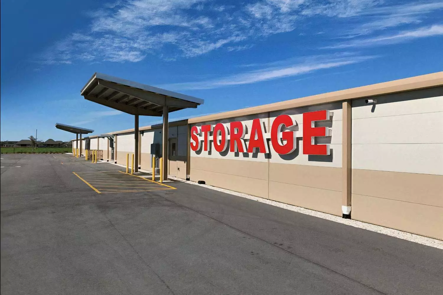 Renting a storage unit in the USA: secure and accessible lockers Corridor of storage unit sections with roll-up doors in a US storage facility
