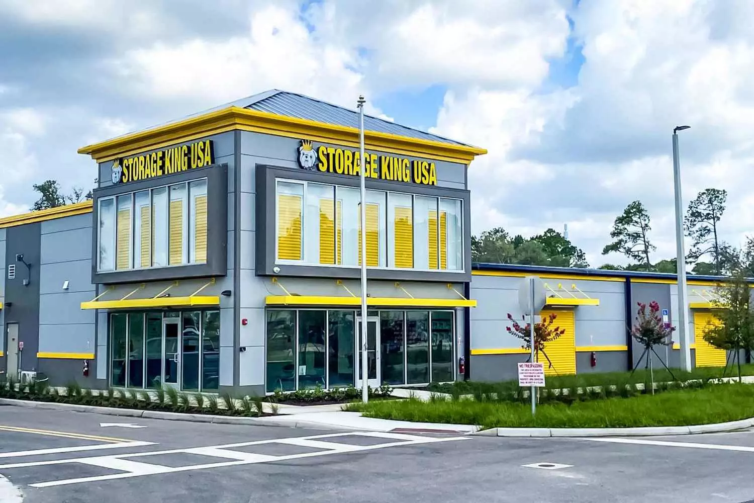 Storage King USA: exterior of the self-storage facility location Exterior view of Storage King self-storage location with multiple unit doors in the US
