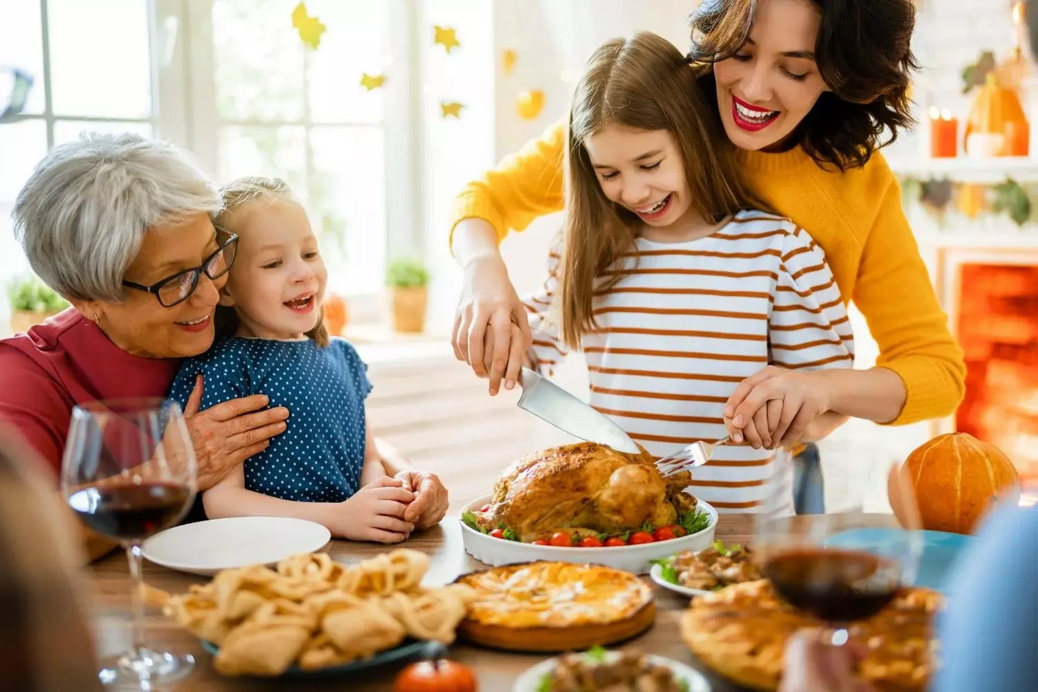 A joyful family sharing a moment of gratitude before starting their festive dinner in a cozy dining room