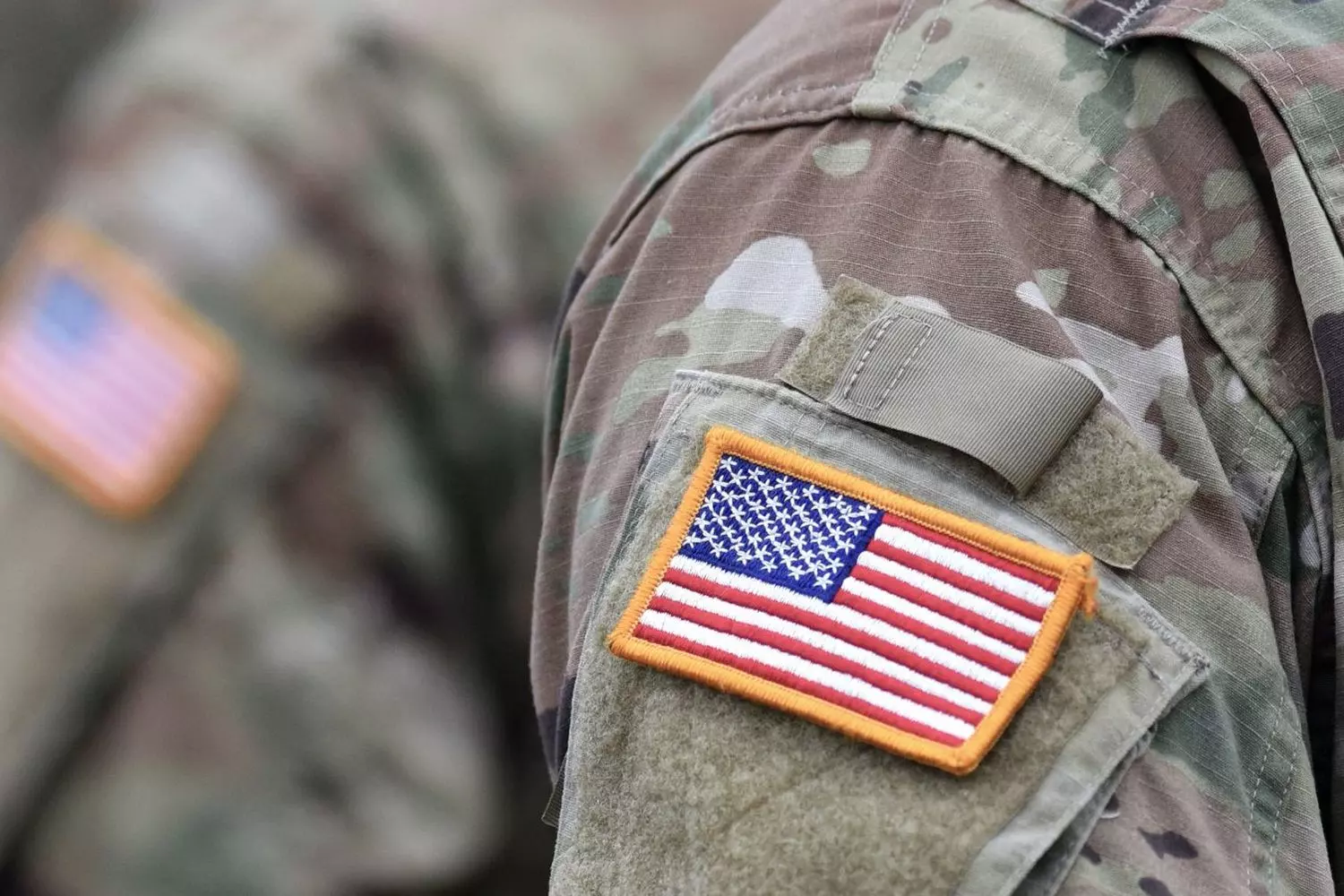 U.S. Flag Patch: Meaning and Regulations for Wearing on Military Uniforms Close-up of a U.S. flag patch on the sleeve of a U.S. military uniform