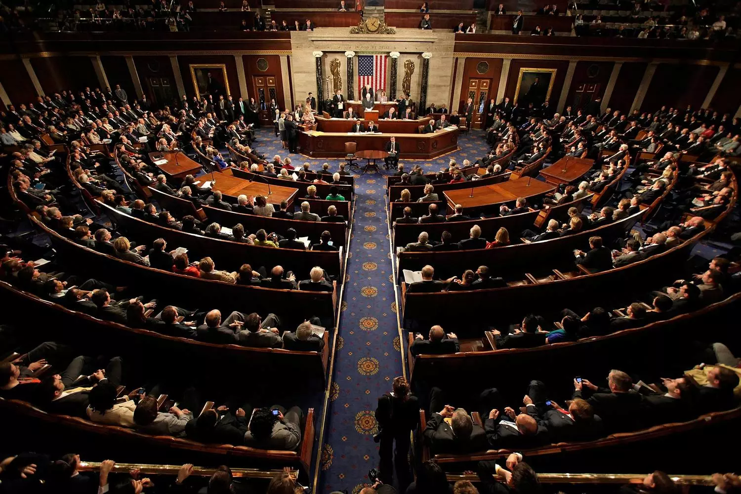 U.S. Senate in session inside the Capitol chamber The U.S. Senate chamber during a session, showing senators at their desks, the presiding officer chair, and the distinctive semicircular layout under the Capitol dome