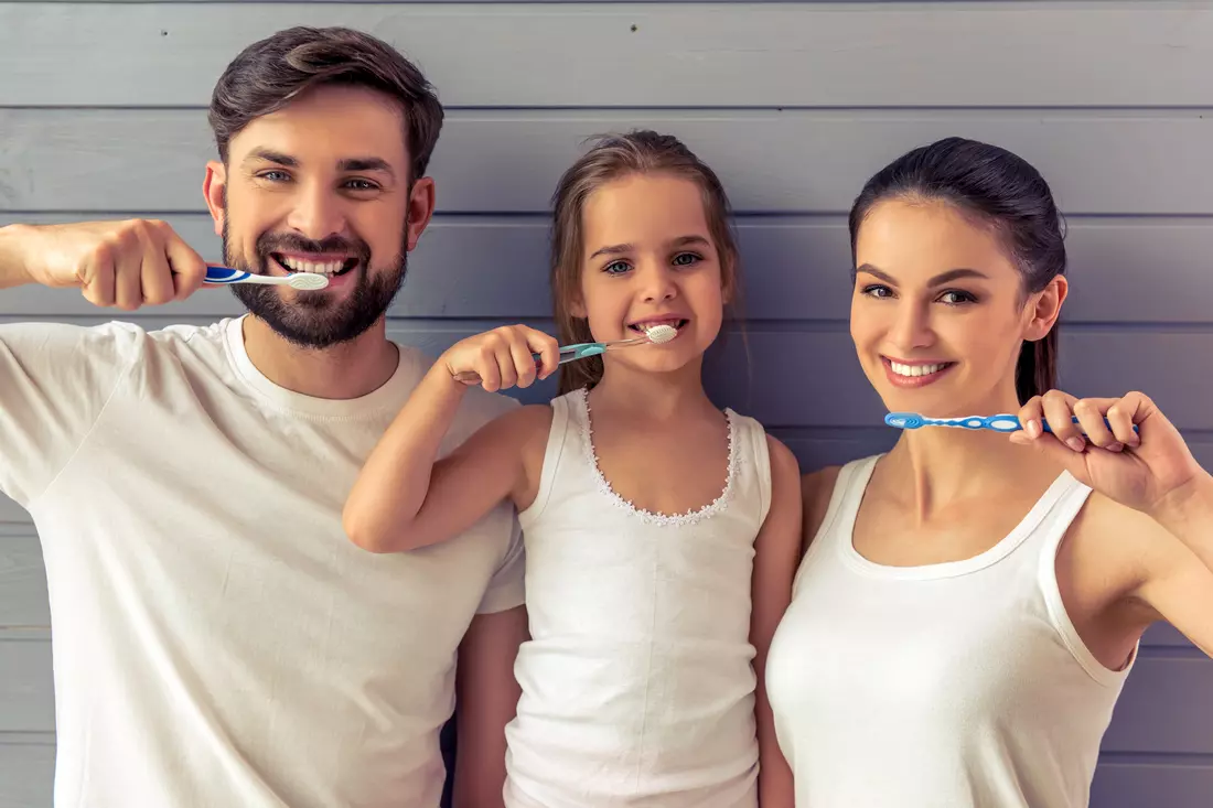 Children's dentistry in Miami — photo family brushing their teeth