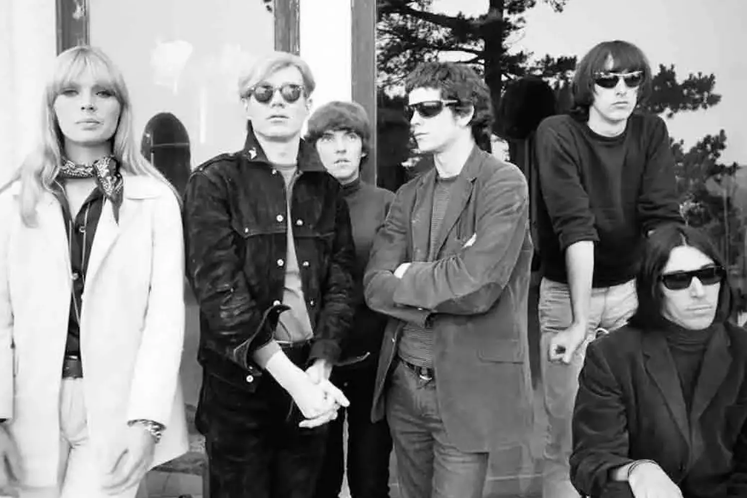 Andy Warhol & The Velvet Underground: The Collision of Pop Art and Rock Revolution Andy Warhol poses with members of The Velvet Underground — Lou Reed, John Cale, Nico and others - at The Factory studio, capturing the historic partnership between the pop art icon and the avant-garde rock band he produced and managed in the mid-1960s