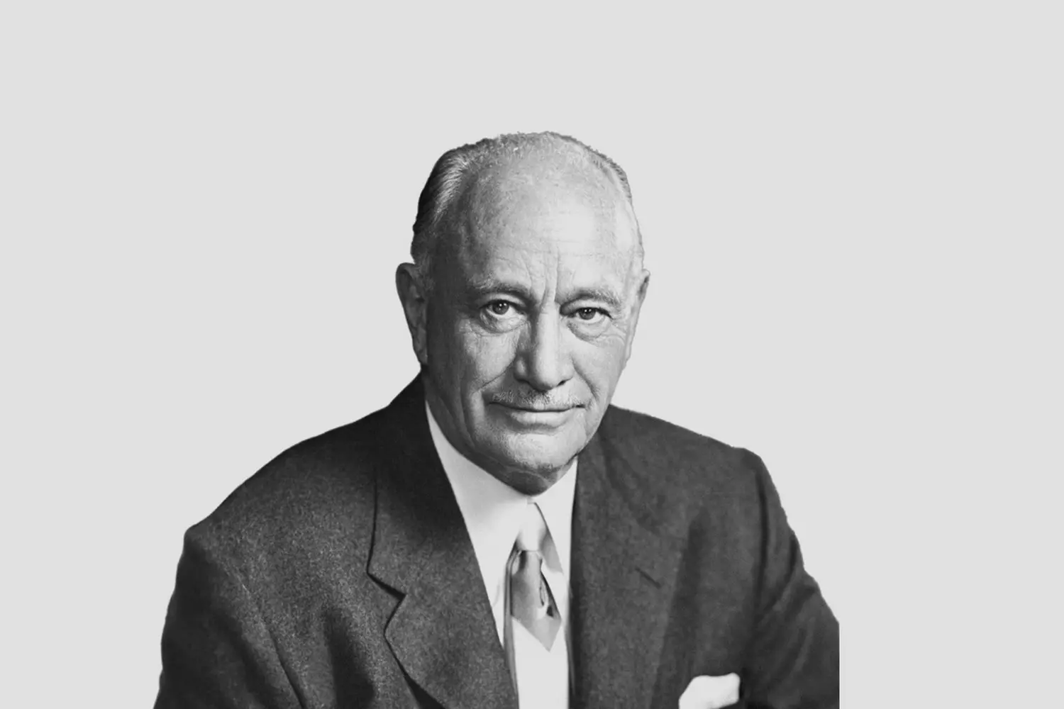Conrad Hilton — Visionary Founder of the Hilton Hotel Empire Conrad Hilton, founder of Hilton Hotels, in a formal portrait