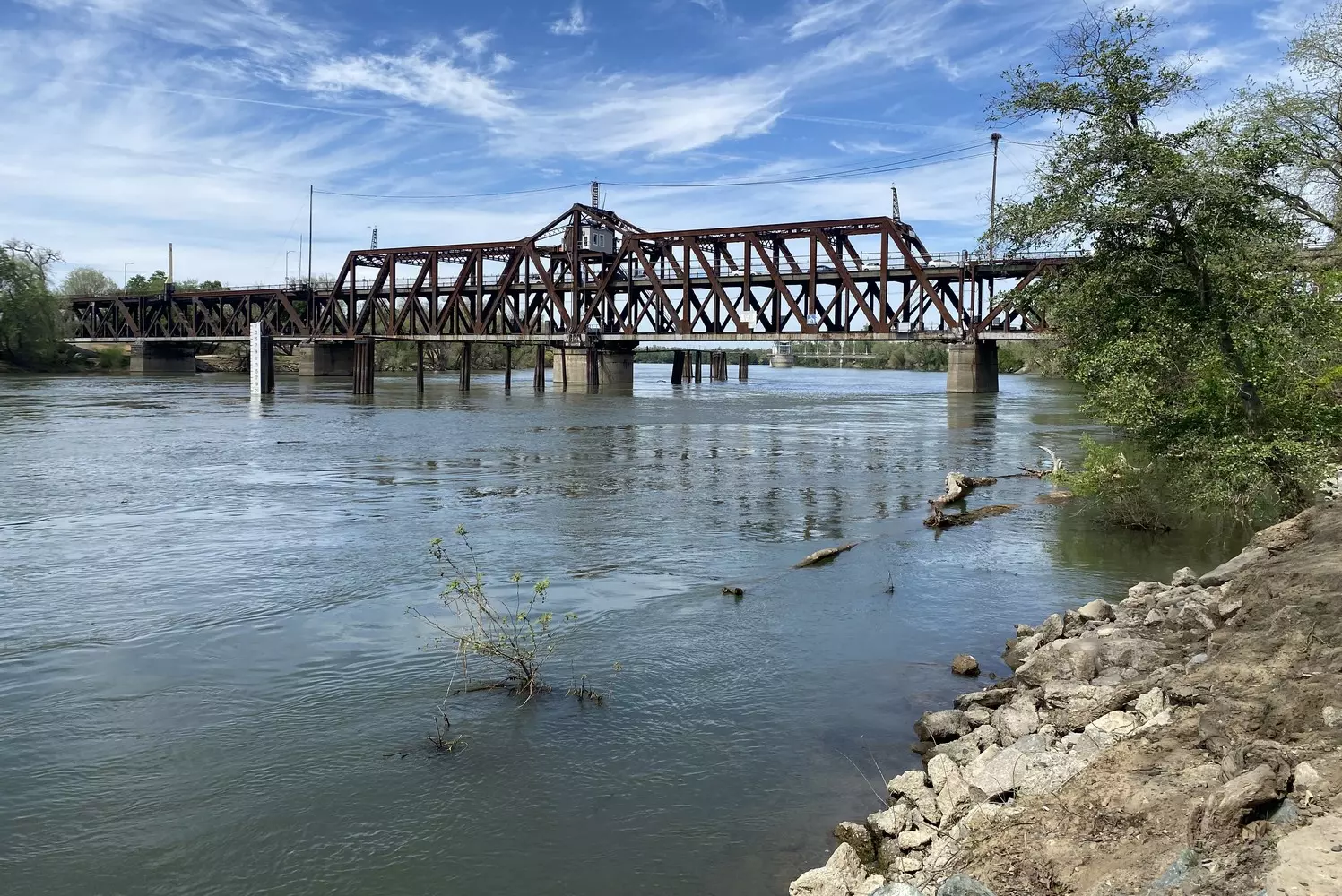 Historic double-deck I Street Railroad Bridge in Sacramento, California, during the day over the Sacramento River