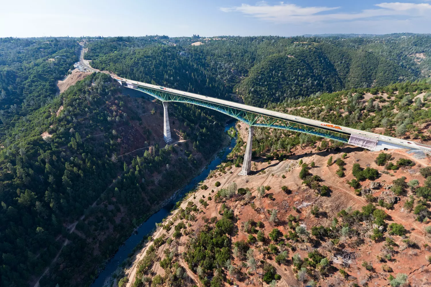 California's tallest bridge — Foresthill Bridge during the day, panorama of the steel arch over the American River canyon