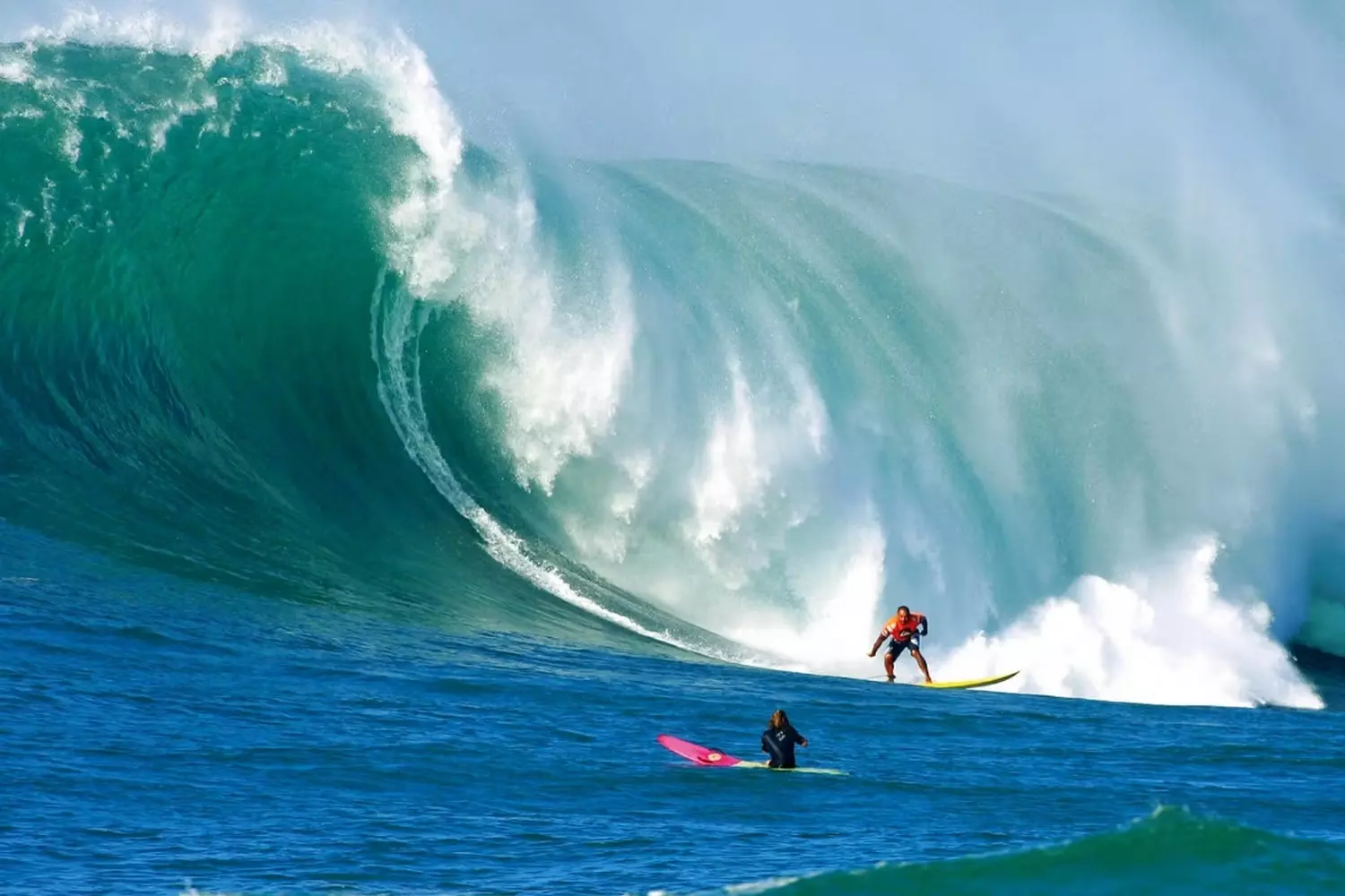 Big Wave Surfing on the North Shore of Oahu, Hawaii A surfer riding a massive barreling wave at Sunset Beach on Oahu's North Shore during a big swell, showcasing the power and beauty of Hawaiian surfing