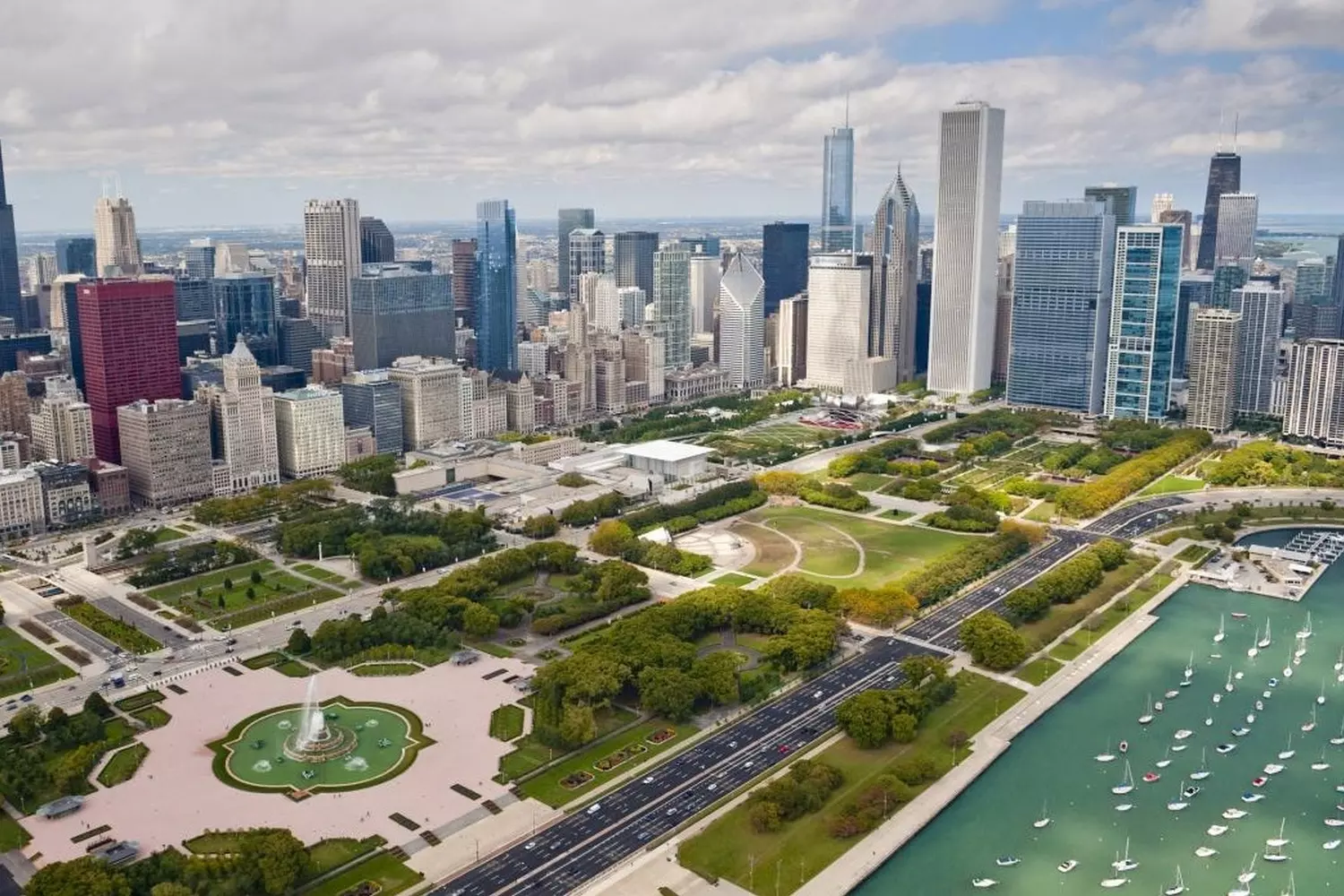 Chicago From Above: The Stunning Bird's-Eye View of Illinois' Crown Jewel Aerial view of Chicago skyline with iconic skyscrapers along Lake Michigan shoreline, showcasing the city's architectural grandeur from above