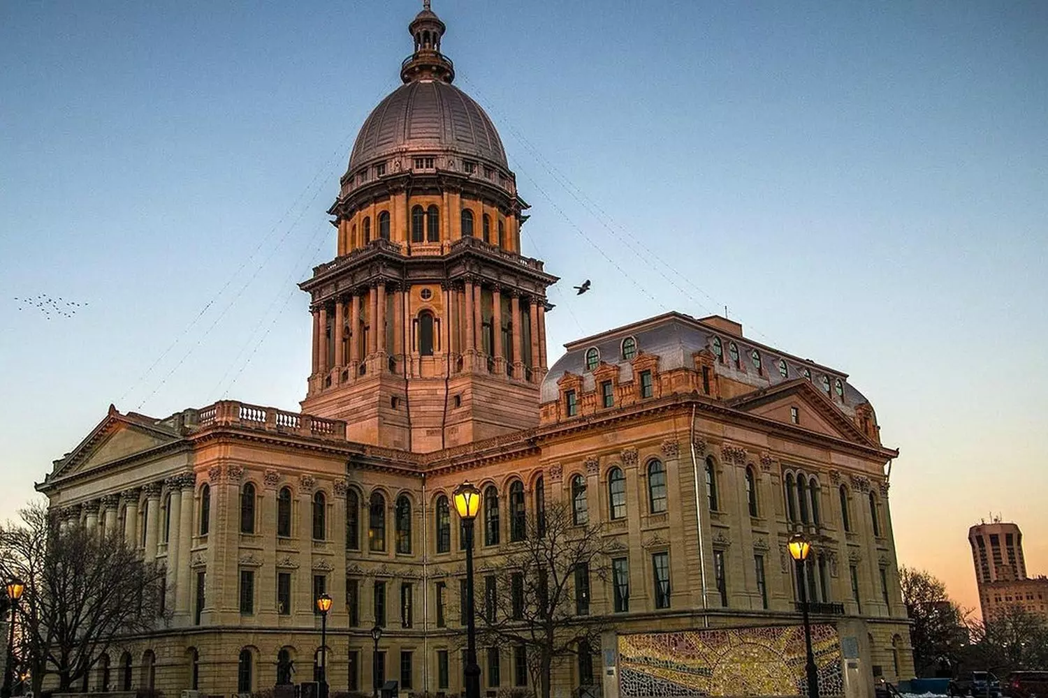 Lincoln's Legacy: Exploring the Historic Charm of Springfield, Illinois Scenic view of downtown Springfield, Illinois featuring the Old State Capitol building with its iconic white columns and dome, surrounded by autumn trees and pedestrian walkways