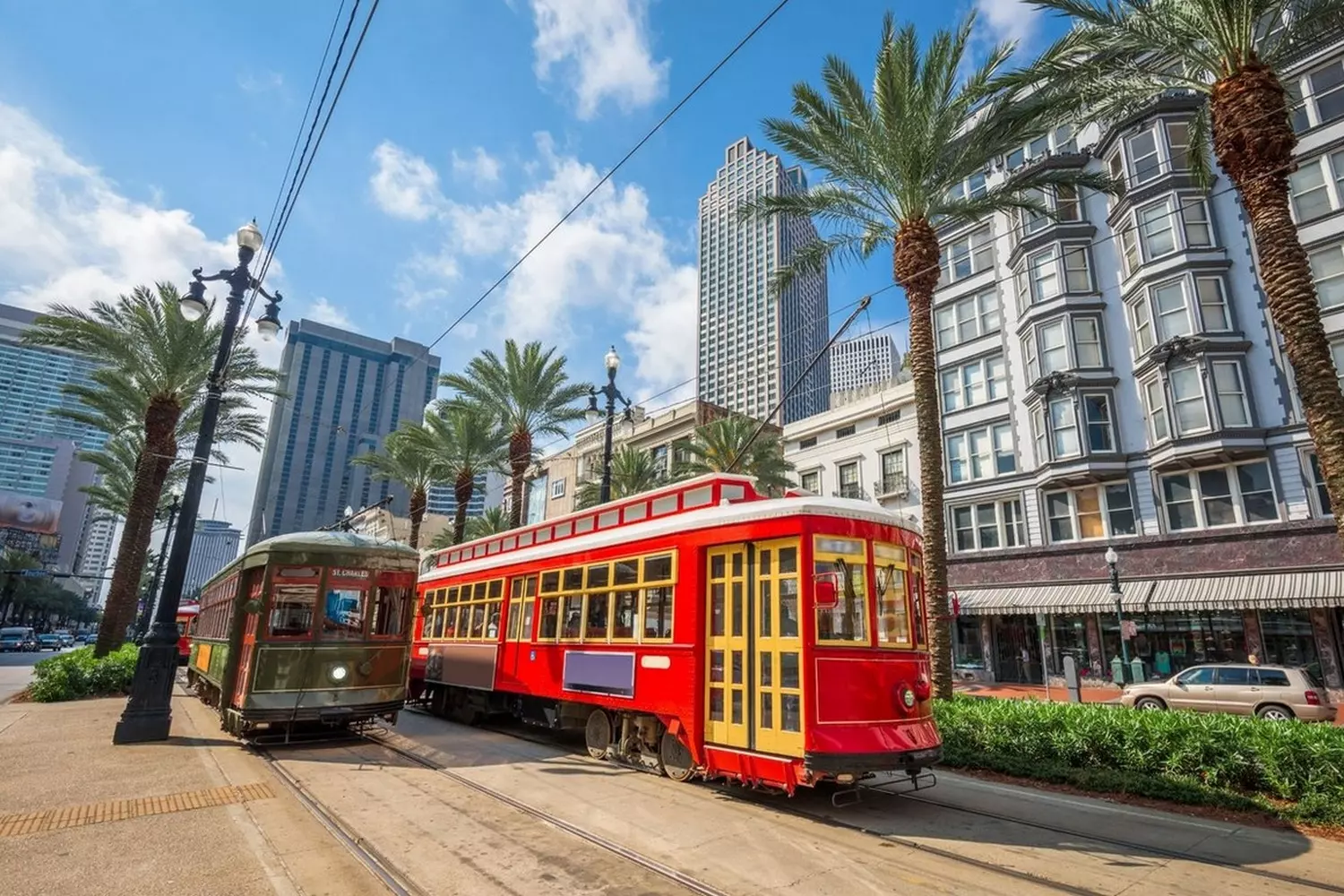 Red Canal Street streetcar traveling through the Mid-City neighborhood in New Orleans, Louisiana